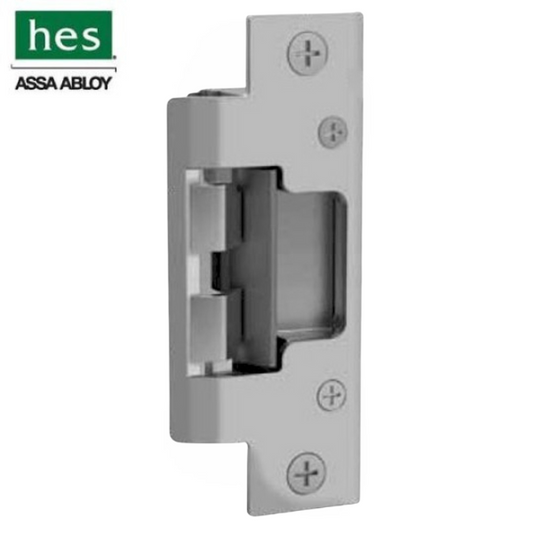 Close-up view of the 801-630 Hes Faceplate in Satin Stainless Finish, designed for 8000/8300 Series electric strikes, showcasing its durable stainless steel construction and compatibility with ANSI metal jambs.